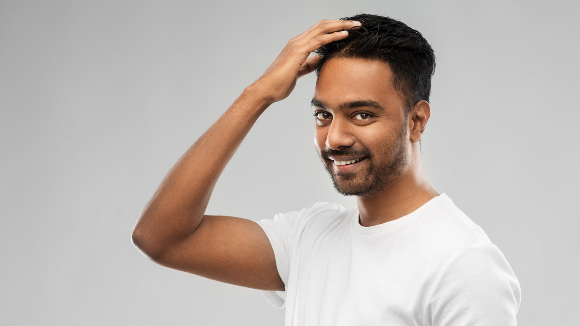 An image of a man flaunting his dandruff free hair.